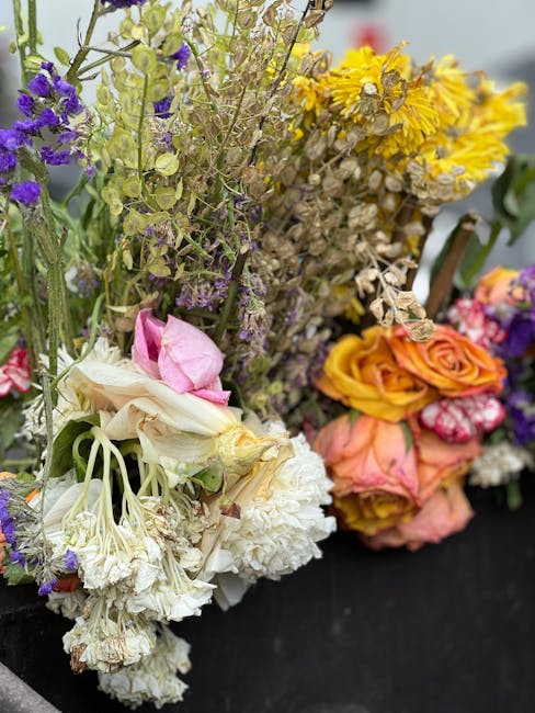 A diverse assortment of fresh flower bouquets featuring a variety of colours and textures, including white, pink, purple, yellow, and orange blooms. The arrangement includes delicate roses, carnations